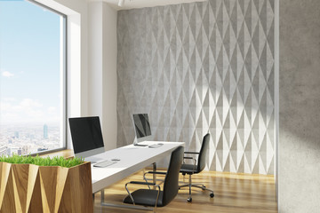 Gray diamond wall pattern open office, closeup