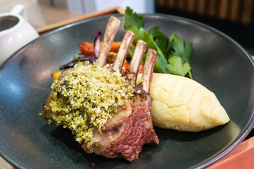 Rack of lamb with pistacio crust, served with mashed potatoes