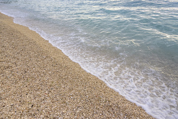 Sea surf on a stony beach.