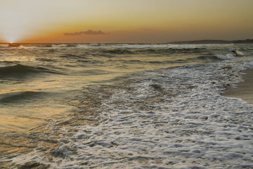 The sea moved to sunset in Salento, Italy
