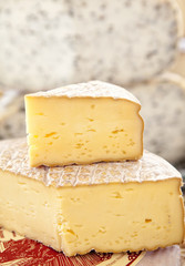 Large round of Cheese at an Outdoor Market in Europe