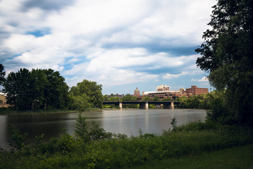 Long exposure of Rochester New York with Genesee river in foreground