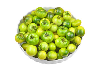 Green tomato on plate