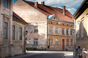 Fototapeta na wymiar Typical houses in latvian city Kuldiga. Street architecture panorama. Kuldiga is a small town in western Latvia