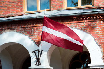 Latvia flag waving on the building