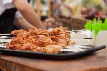 cooking barbecue at the festival of street food