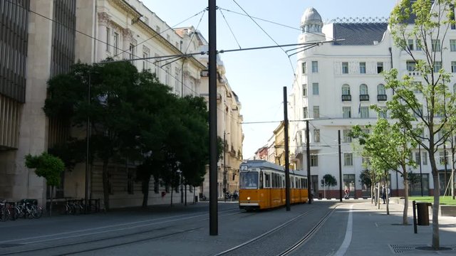 Yellow tram passing in Budapest, Hungary