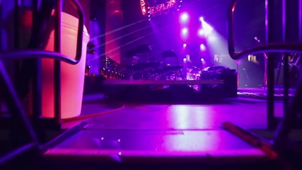 POV of musician entering a stage through stairs for sound check before concert - Powered by Adobe
