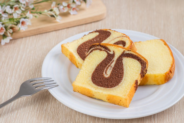 Butter cake sliced on plate