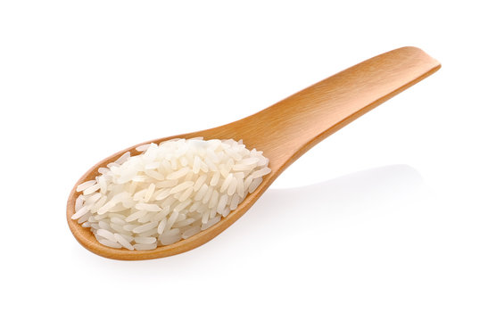 rice in wood spoon on white background
