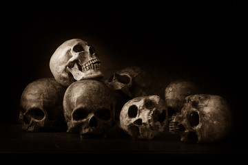 Genocides, Stacked human skulls at the Killing Fields, Sepia Tone
