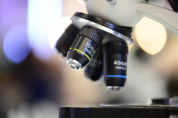 Plakat Optical Microscope.Microscope is used for conducting planned, research experiments, educational demonstrations in medical and health institutions, laboratories. Close up photo.