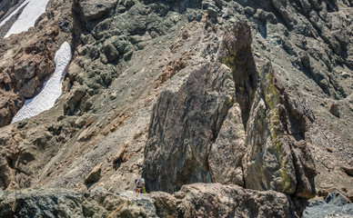 Climber Rappels into Rocky Terrain