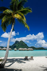 Bora Bora beach scene with over the water bungalows