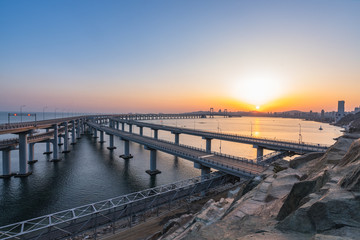 Dalian Cross-Sea Bridge at dusk.