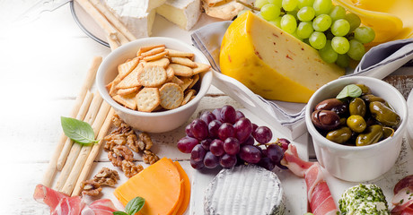 Charcuterie assortment, cheeses, olives and fruits