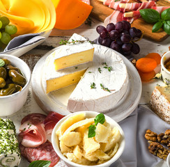 Charcuterie assortment, cheeses, olives and fruits