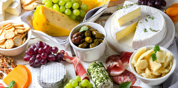 Charcuterie assortment, cheeses, olives and fruits