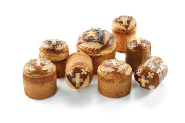 Various Easter cakes freshly baked just from the oven isolated on white celebration tradition seasonal food bread bakery concept.