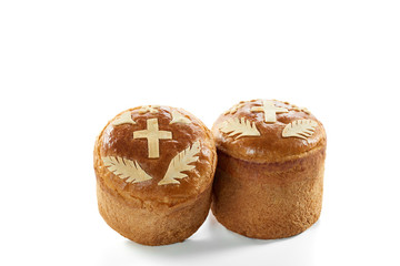 Two Easter cakes isolated on white festive celebration tradition food eating bakery pastries concept. 