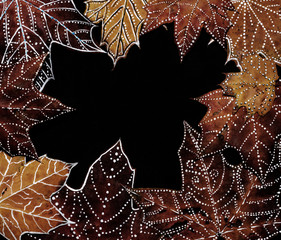 Autumn leaves with white dots