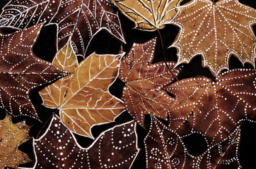 Autumn leaves with white dots