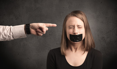 Hand pointing at woman