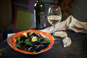 Mussels on ice ready to cook with lemon and white wine jpg