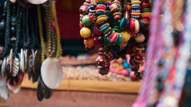 Close up of colorful bracelets and pendants hanging. Shot with Sony a7s and Atomos Ninja Flame.