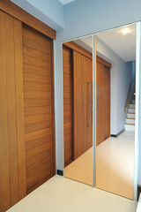 Fototapeta premium modern apartment with wood door and the staircase