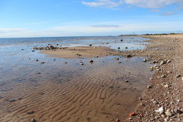Pebbles and sand in shallow waters in the Gulf
