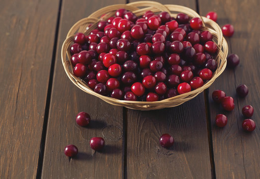 cherries on wooden surface