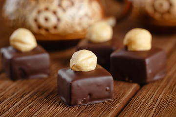 Handmade chocolate bonbons with hazelnut