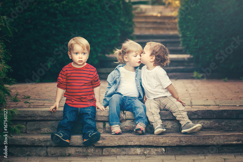 Group Of Three Cute Funny Adorable White Caucasian Children Toddlers Boys Girl Sitting Together Kissing Each Other Love Friendship Childhood Concept Best Friends Forever Toned With Retro Filters Wall Mural Anoushkatoronto Group Of Three Cute Funny Adorable White Caucasian Children Toddlers Boys Girl Sitting Together Kissing Each Other Love Friendship Childhood Concept Best Friends Forever Toned With Retro Filters Wall Mural Anoushkatoronto