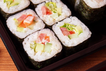 Rolls and sushi on the table in the package