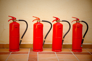 Obraz premium Four fire extinguishers