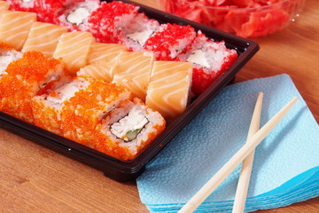 Rolls and sushi on the table in the package