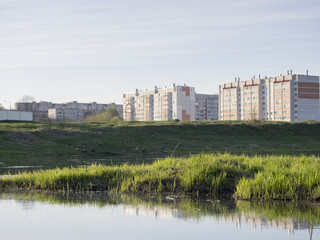 Fototapeta na wymiar Houses on the river bank