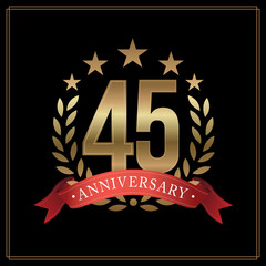 45 years golden anniversary logo, with star, red ribbon, and  laurel wreath isolated on black background, vector design