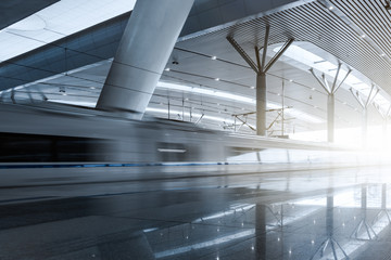 Side view of high-speed rail in platform.