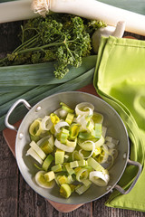 leek on pan, top view
