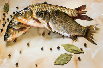 River fish with spices in its raw form