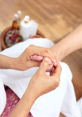 Obraz na płótnie Canvas Foot massage in spa salon,Thai massage.