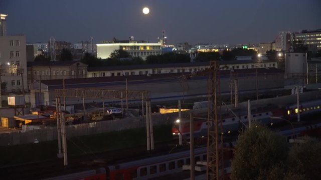  night movement of trains on a railway junction in moon light