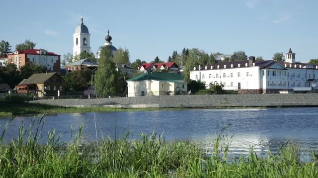 provincial town Myshkin cityscape outstanding on waterfront of Volga river
