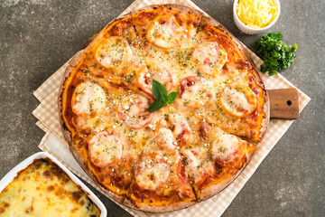 tomatoes pizza on table