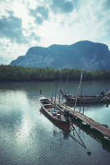 Naklejka na ściany i meble Traveling life, fishing boats, Morning sunrise, peaceful atmosphere.. Asia Thailand