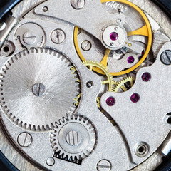 steel clockwork of old mechanical wristwatch