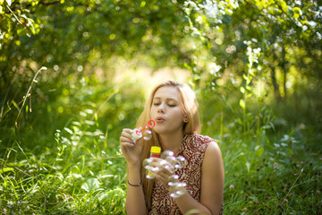 Young beautiful woman in forest