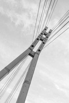 Fototapeta Metal bridge tower in black and white
